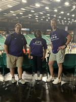 CTHS female powerlifter and coaches